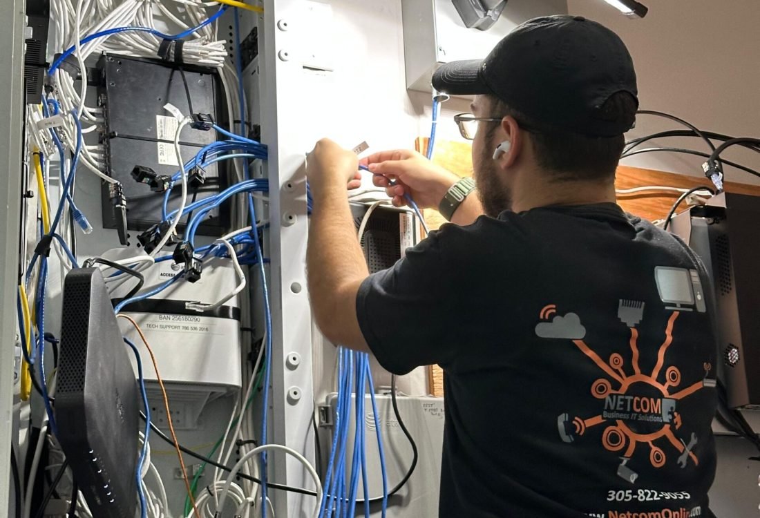 Jared Wiring Technician organizing network panel
